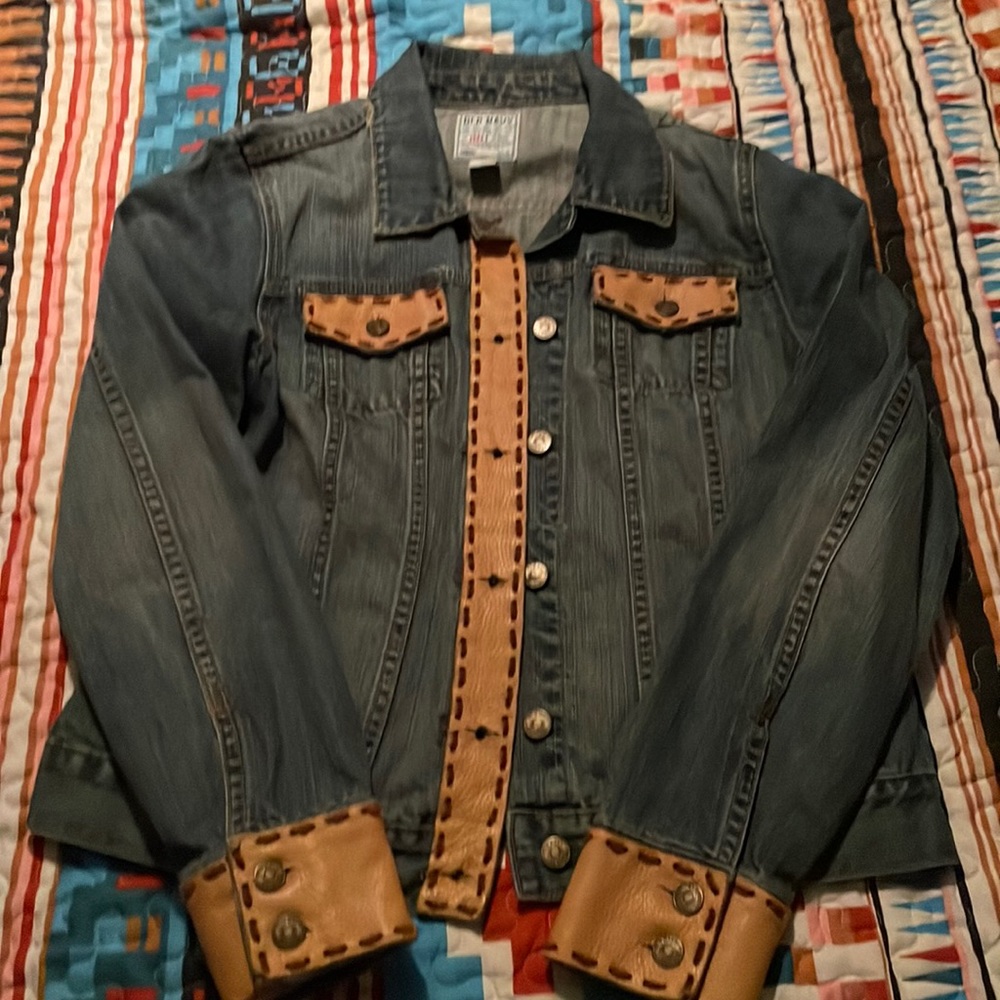 Custom made leather trimmed women’s denim jacket